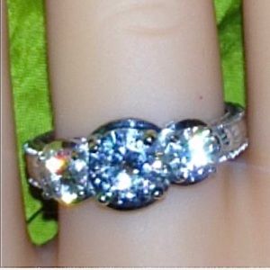 Authentic Charles & Colvard Moissanite 3 stone Ring. (Better Than a Diamond